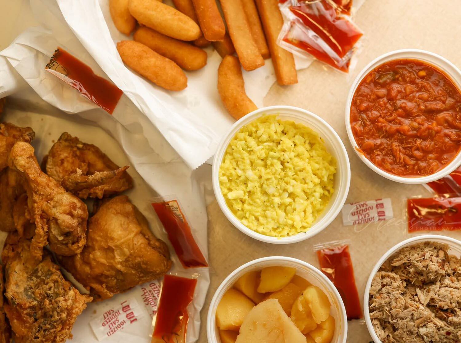 Assortment of food displayed on table at Wilson, NC restaurant - Discover Wilson