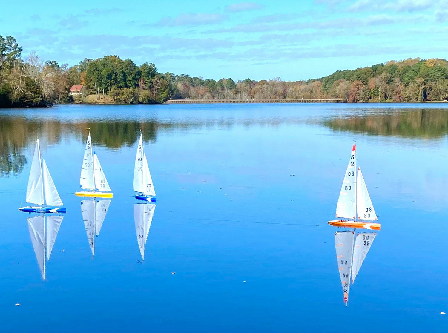 Kayaks with sails on lake in Wilson, NC - Discover Wilson