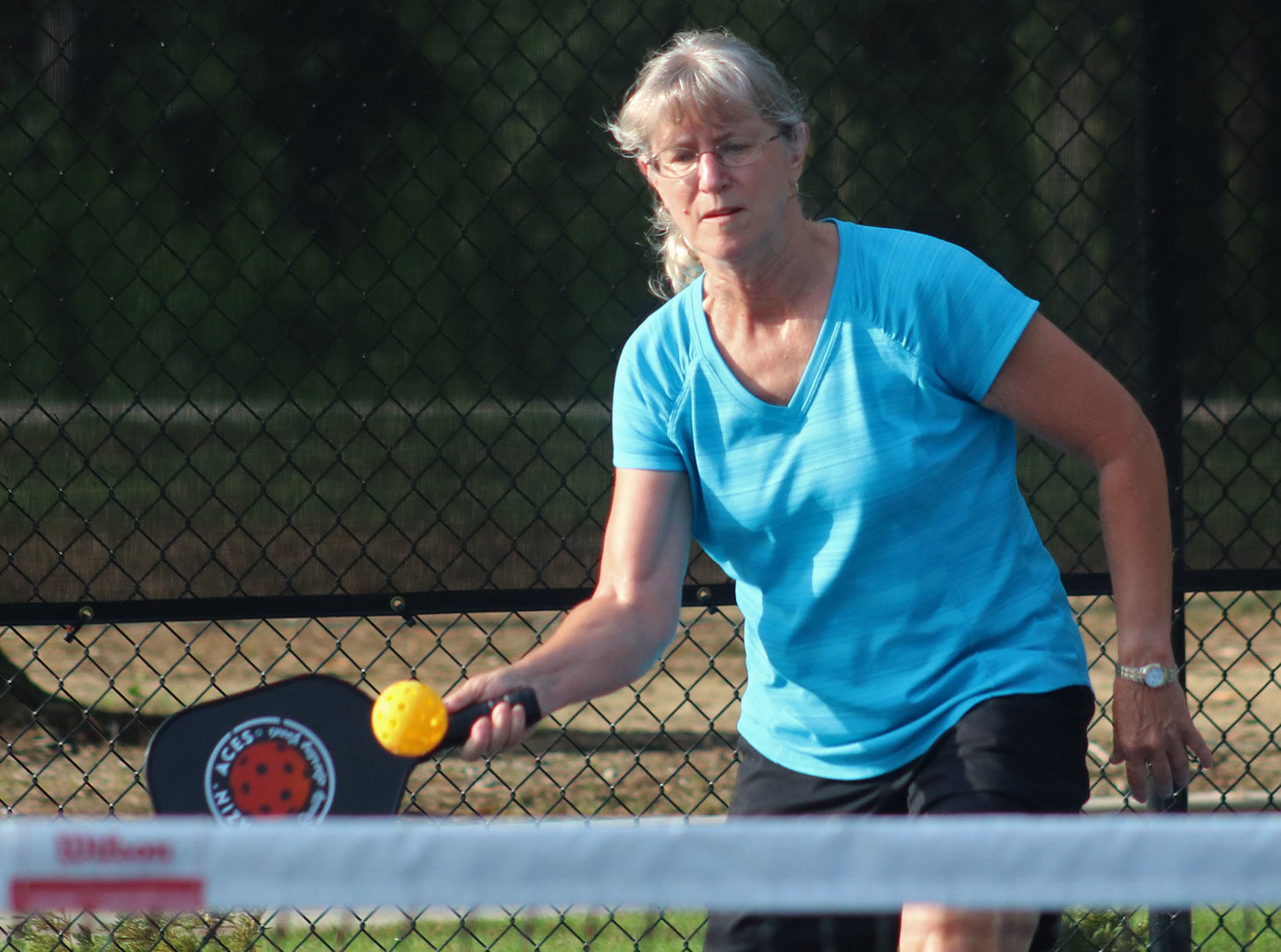 Retiree playing pickleball in Wilson, NC - Discover Wilson