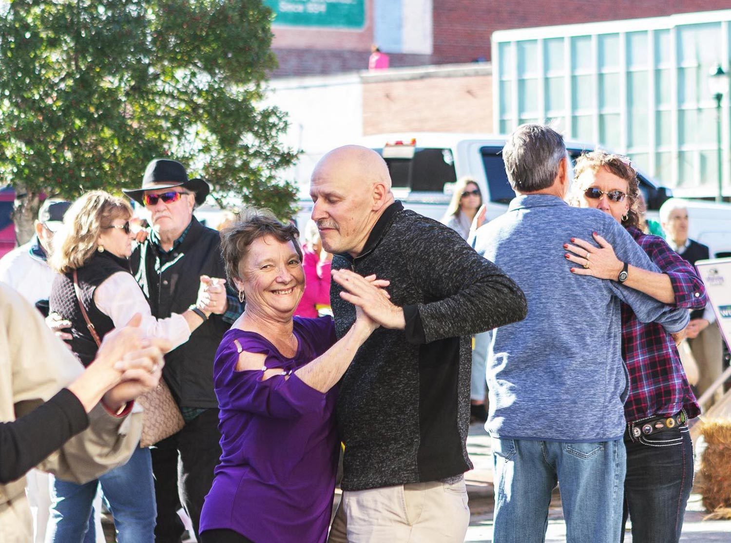 Retirees dancing outdoors at event in Wilson, NC - Discover Wilson